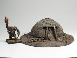 Gurk, trying to find a spot to plant his Dwarf Pogo in front of his new home.