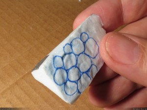 Using a rock to create texture.