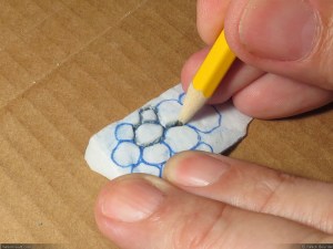 Using a pencil to "carve" (This time I push deeper, so the roundness of the pencil tip makes the individual stones edges rounder).